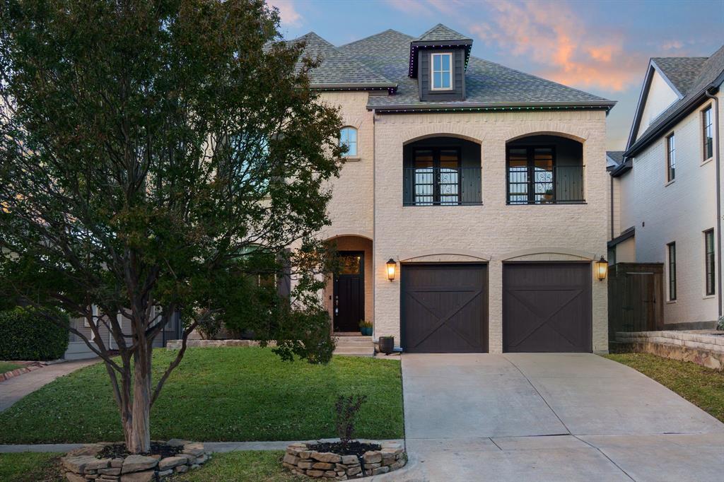 6211 Velasco Avenue Dallas, TX 75214 - Photo 35 of 38 a front view of a house with garden