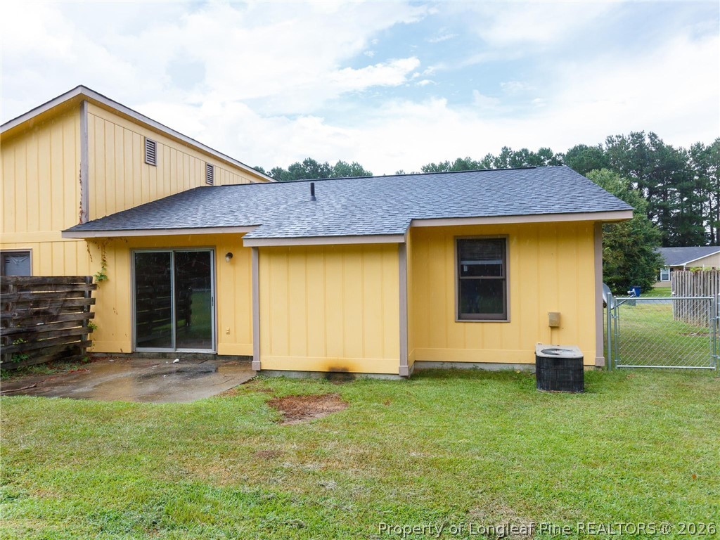 115 Eulon Loop, Unit A Raeford, NC 28376 - Photo 15 of 16 a view of a house with backyard