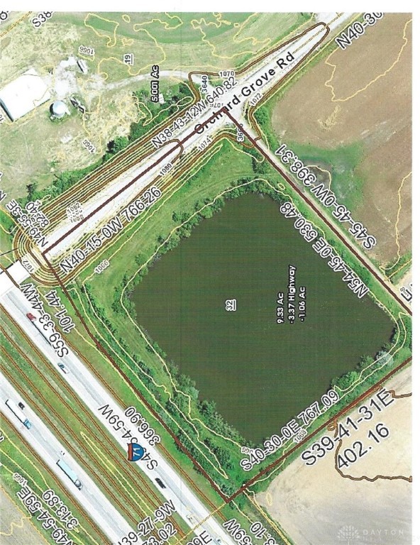 4.9 acres with Pond