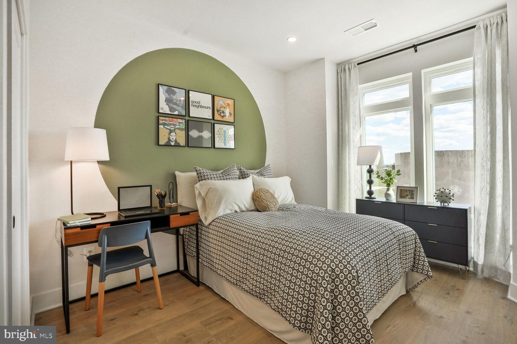 61 Lower Service Road Northwest, Unit 877 Washington, DC 20422 - Photo 10 of 21 a bedroom with a bed and a window