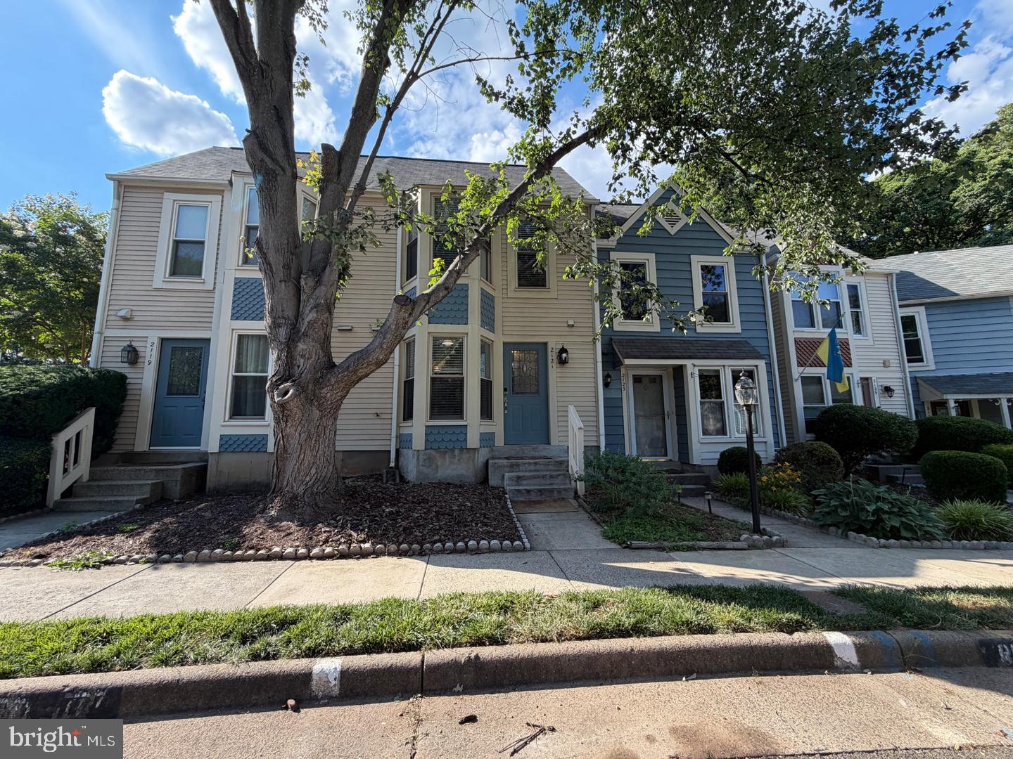 2121 Whisper Way Reston, VA 20191 - Photo 46 of 68 Charming townhomes with lush greenery.