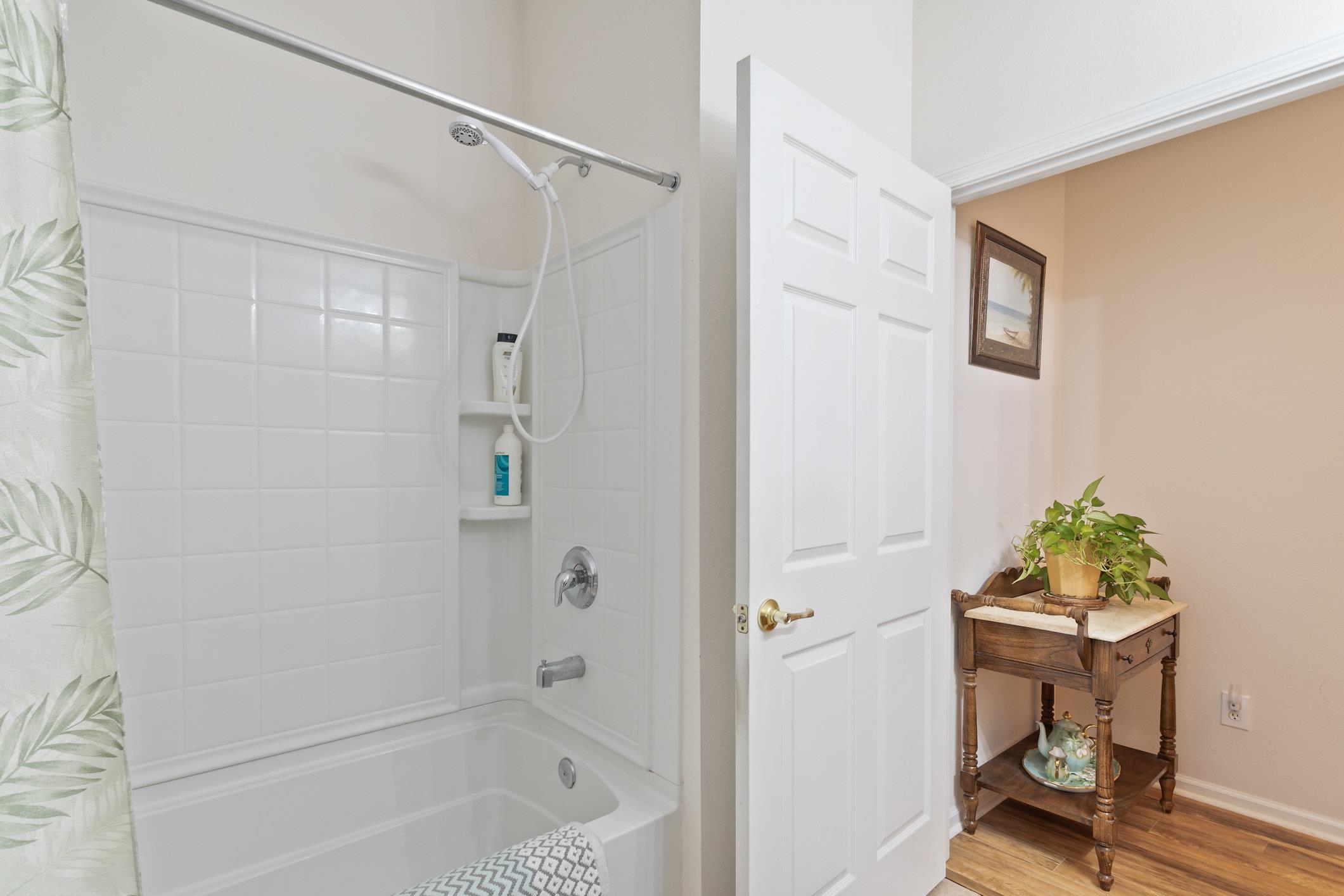 554 Wooded Crossing Circle St. Augustine, FL 32084 - Photo 12 of 43 a bathroom with a shower