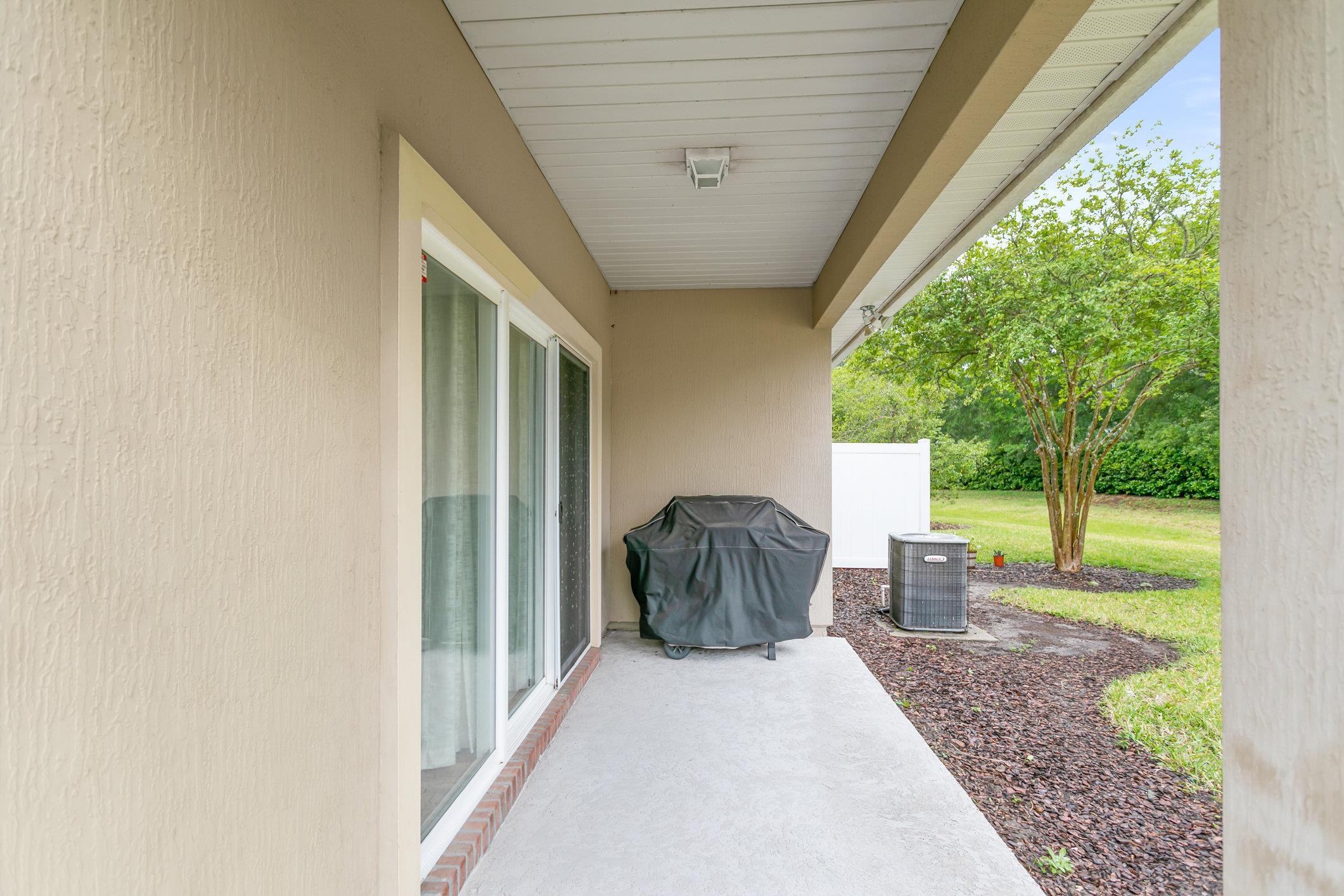 554 Wooded Crossing Circle St. Augustine, FL 32084 - Photo 24 of 43 a house view with a garden space