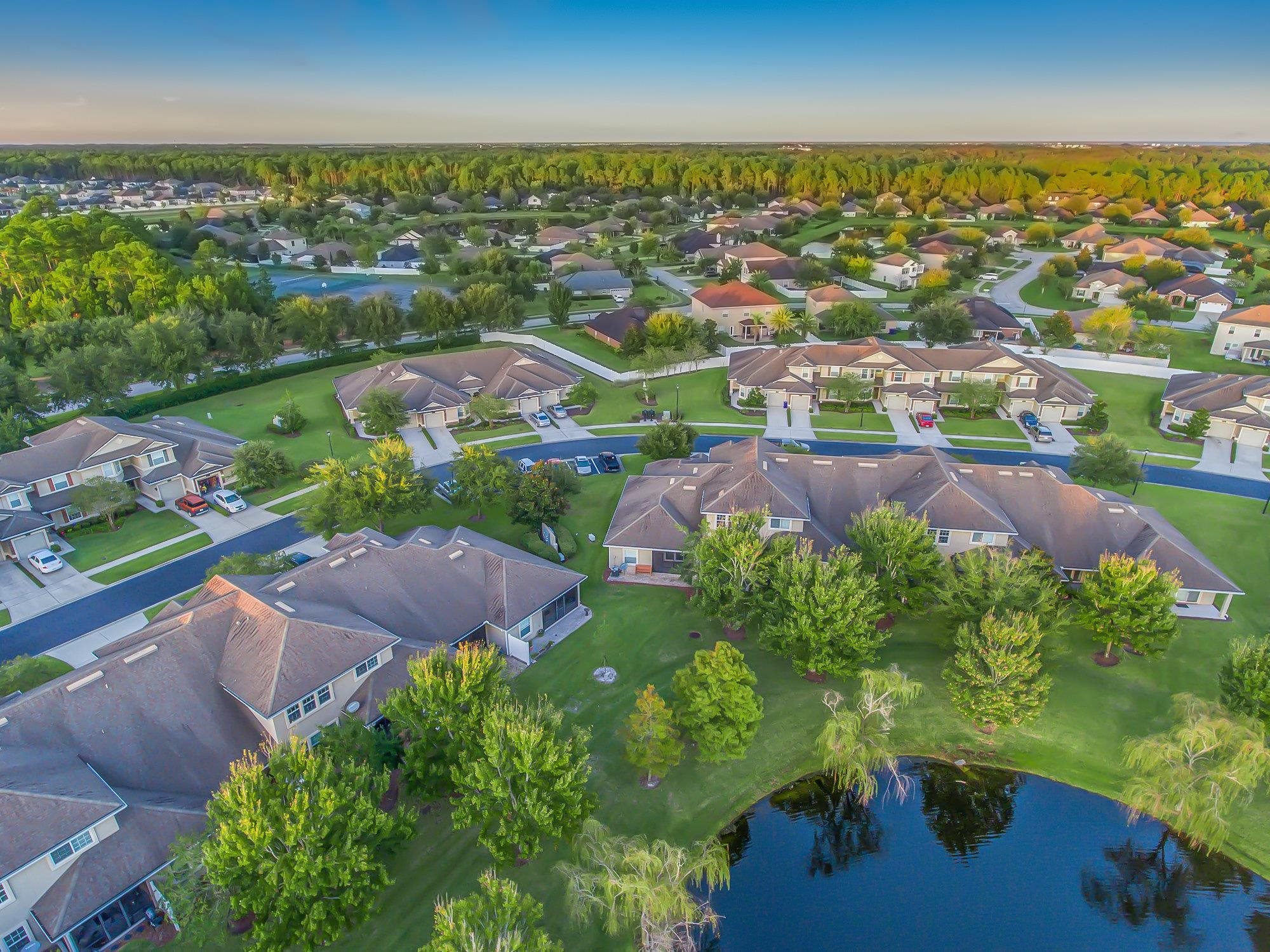 554 Wooded Crossing Circle St. Augustine, FL 32084 - Photo 27 of 43 an aerial view of residential houses with outdoor space