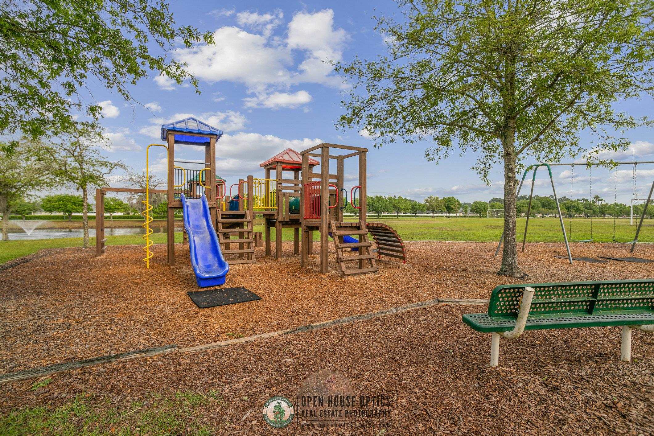 554 Wooded Crossing Circle St. Augustine, FL 32084 - Photo 30 of 43 a view of a park with slide