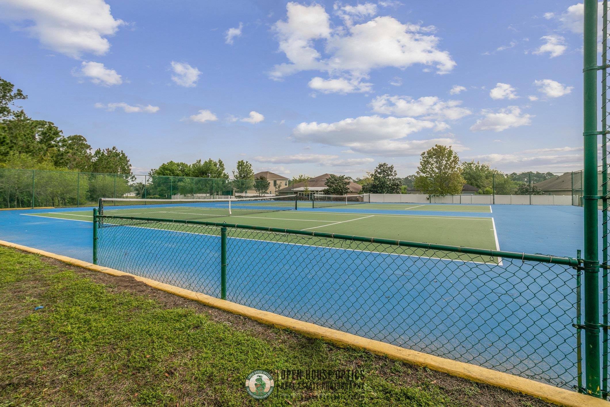 554 Wooded Crossing Circle St. Augustine, FL 32084 - Photo 33 of 43 a view of a field and grass