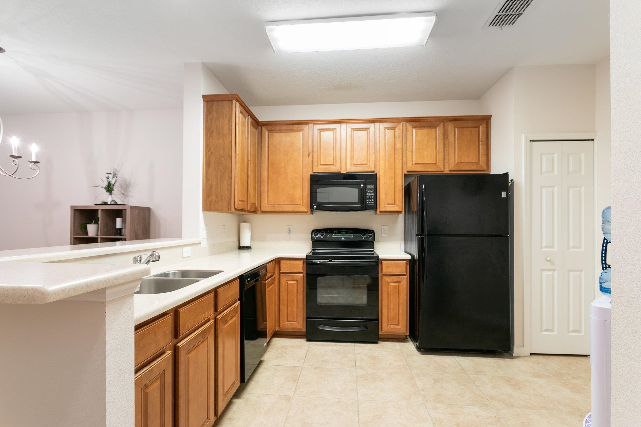 554 Wooded Crossing Circle St. Augustine, FL 32084 - Photo 5 of 43 a kitchen with stainless steel appliances granite countertop a refrigerator stove and sink