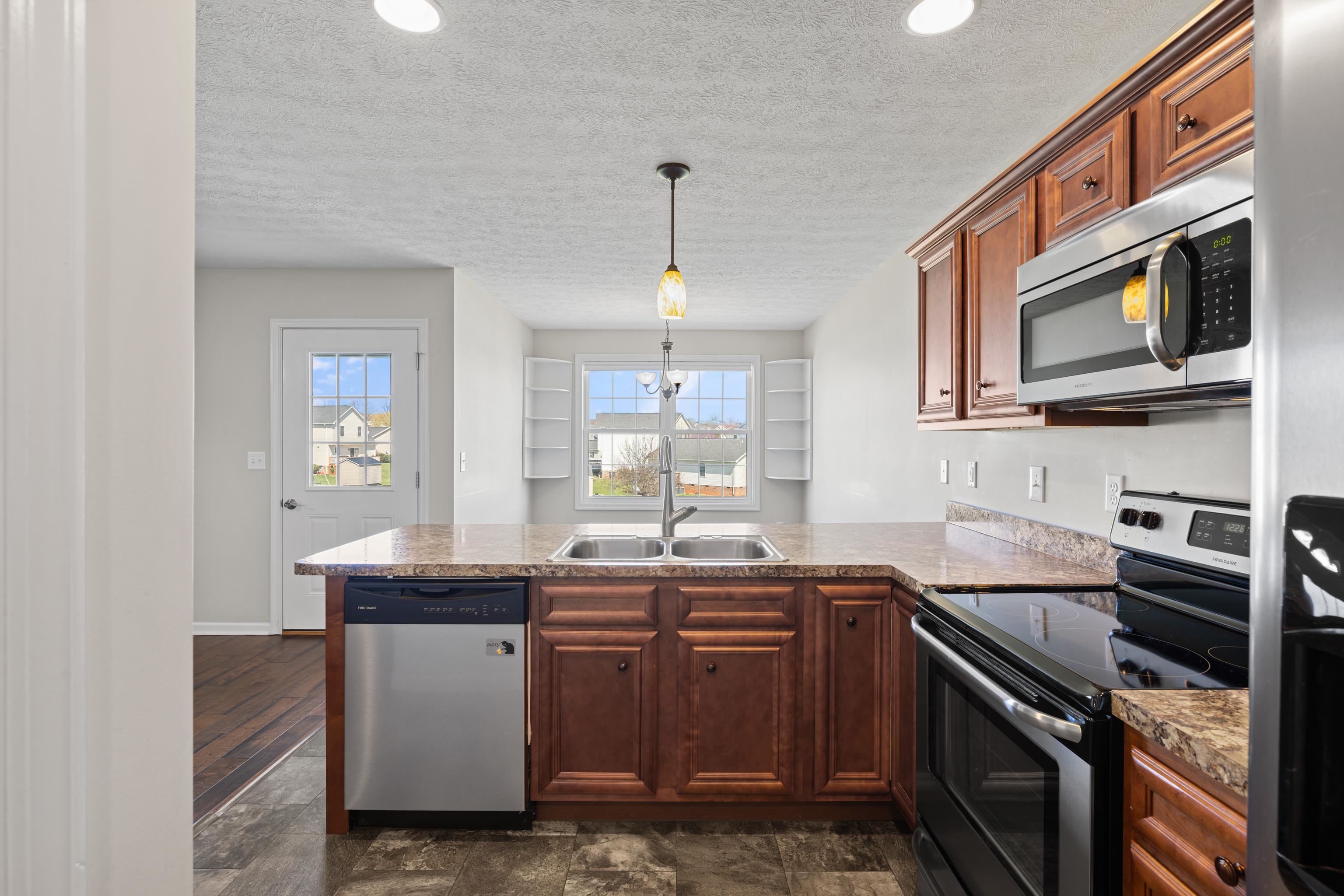 3365 Legion Way Broadway, VA 22815 - Photo 12 of 69 a kitchen with stainless steel appliances a sink stove and microwave