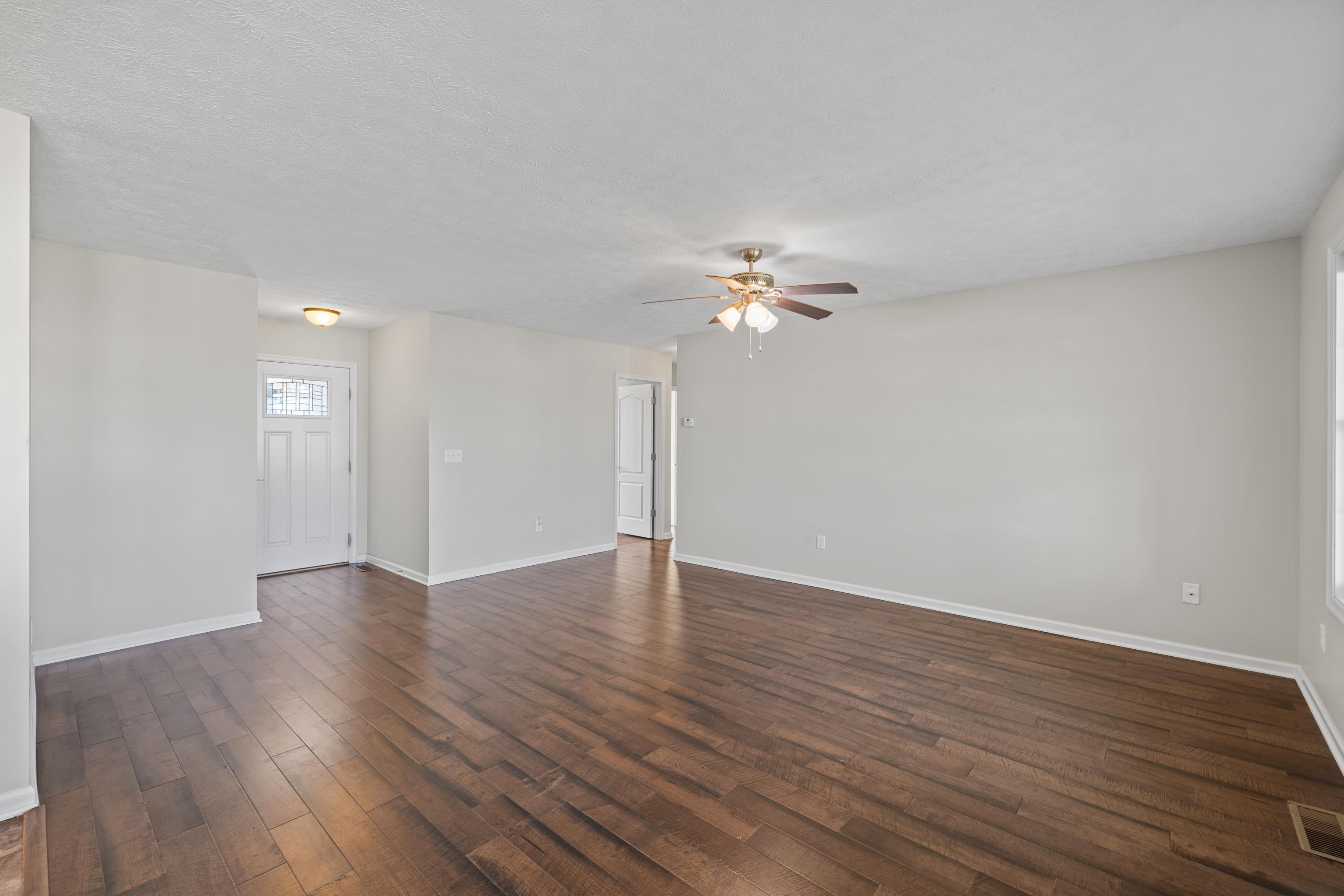 3365 Legion Way Broadway, VA 22815 - Photo 3 of 69 a view of an empty room with wooden floor