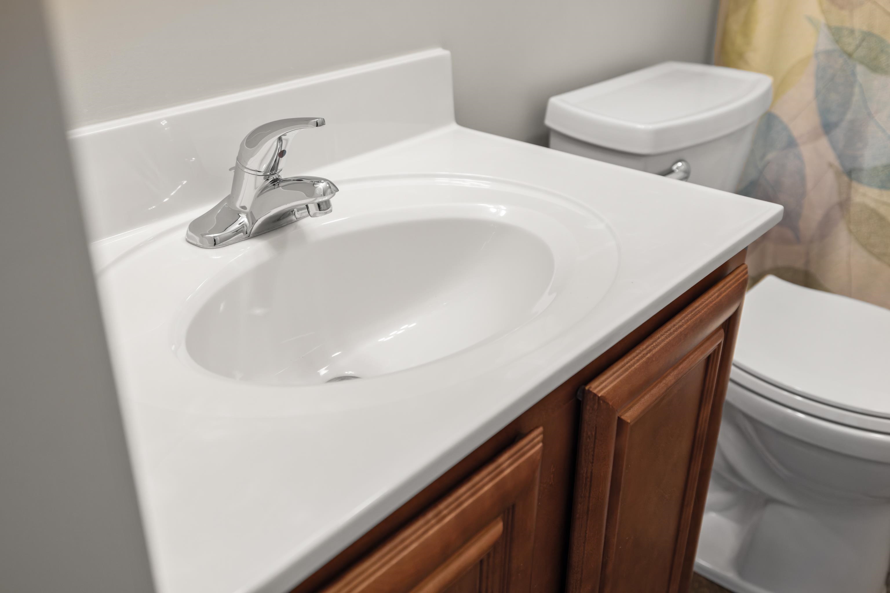3365 Legion Way Broadway, VA 22815 - Photo 33 of 69 a bathroom with two sinks a toilet and a mirror