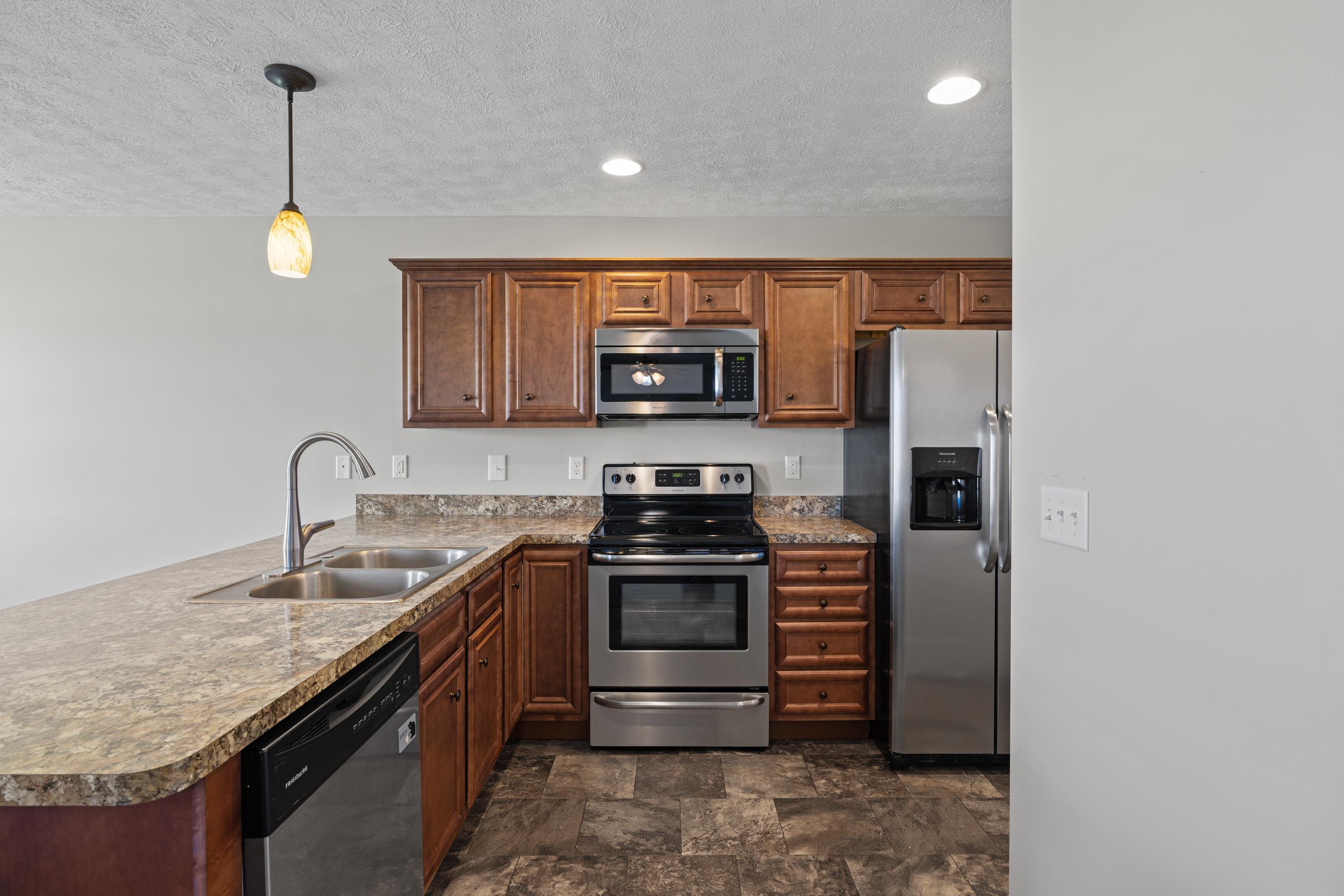 3365 Legion Way Broadway, VA 22815 - Photo 8 of 69 a kitchen with stainless steel appliances granite countertop a stove and a sink