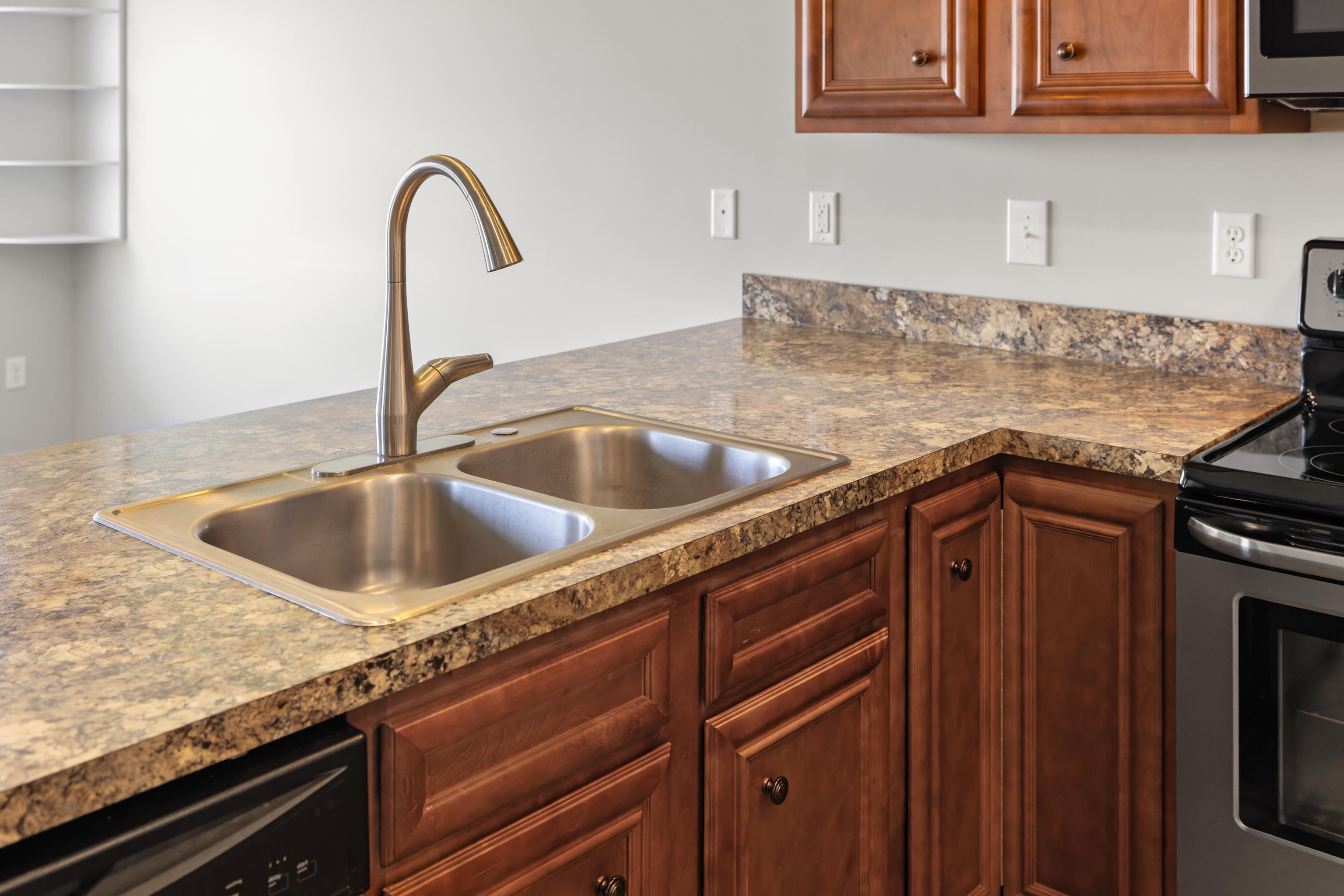 3365 Legion Way Broadway, VA 22815 - Photo 9 of 69 a kitchen with granite countertop a sink and a stove