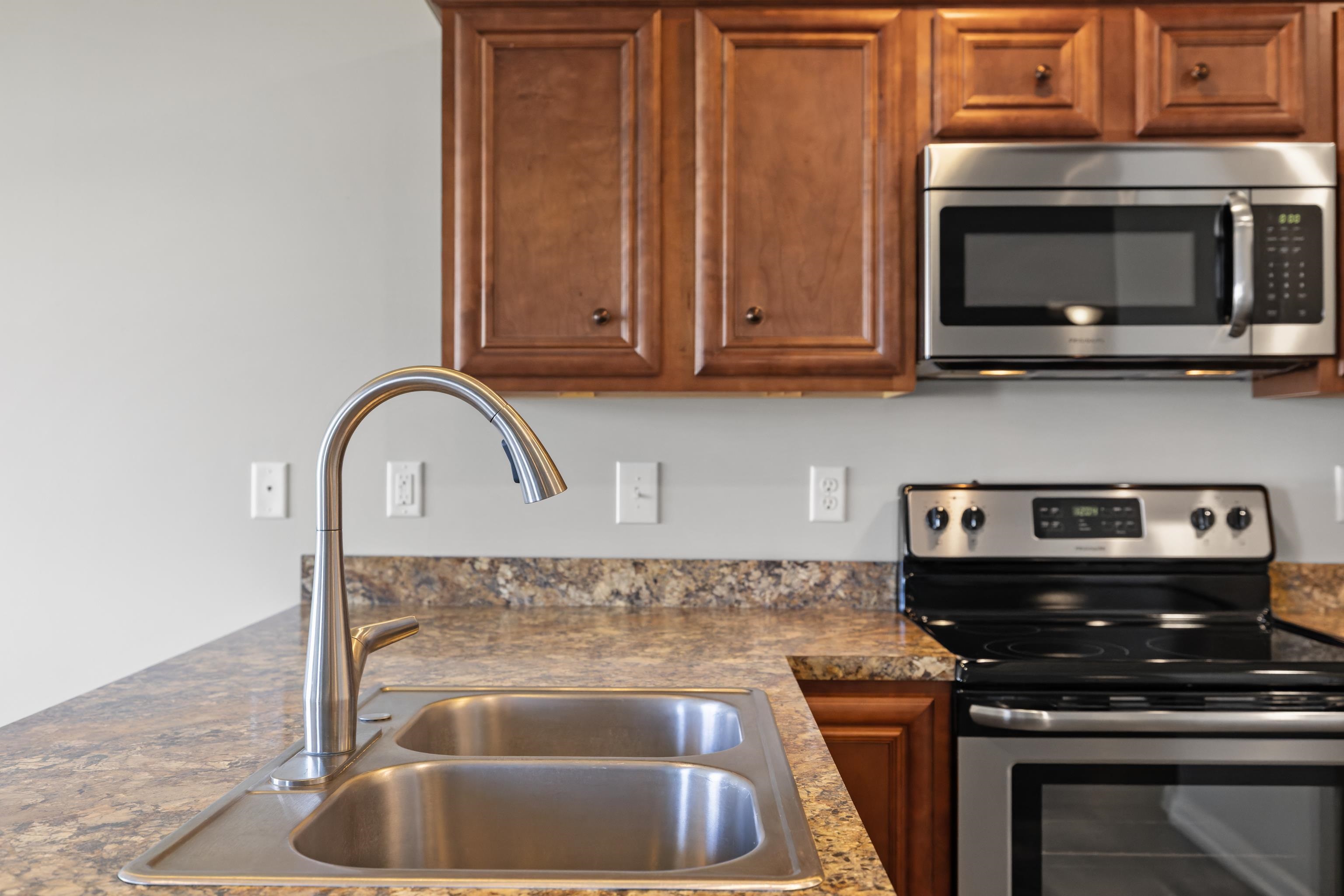 3365 Legion Way Broadway, VA 22815 - Photo 10 of 69 a kitchen with granite countertop a stove and a sink