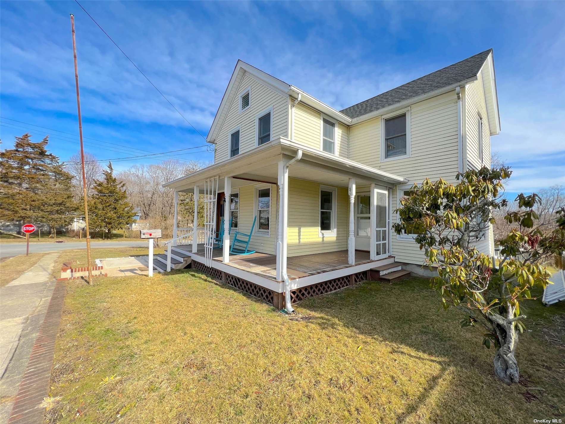 1050 Champlin Place Greenport, NY 11944 - Photo 1 of 17 a view of a house with backyard porch and sitting area