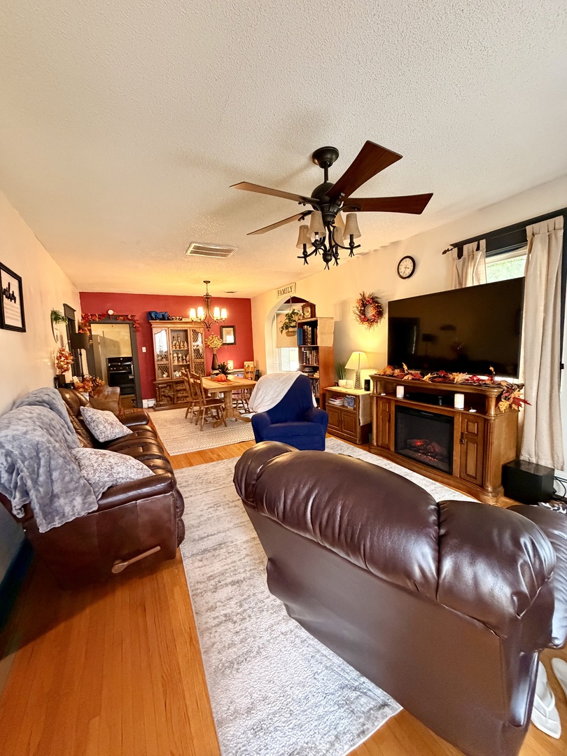 329 West Devlin Street Spring Valley, IL 61362 - Photo 3 of 11 a living room with furniture and a flat screen tv