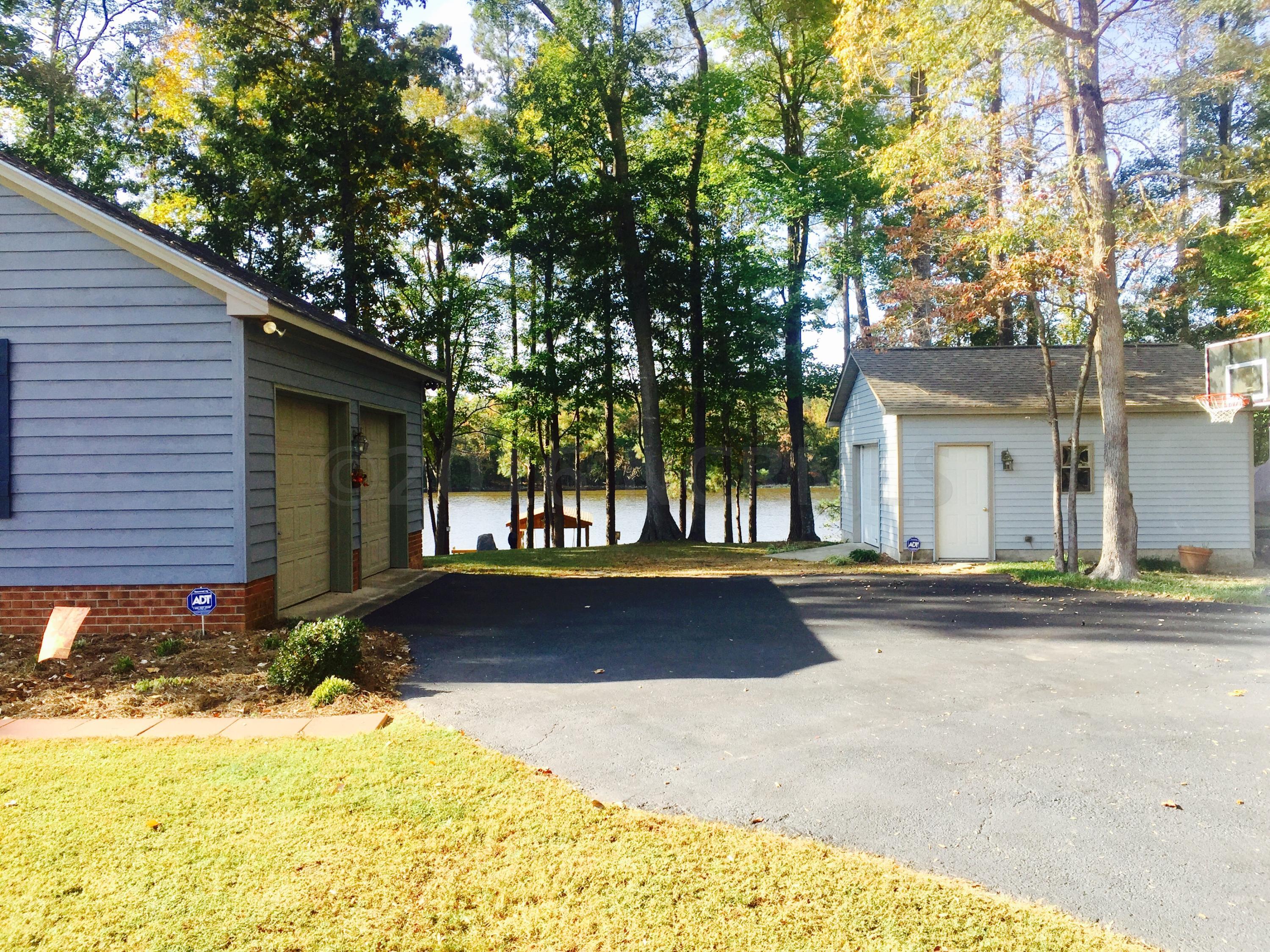 6924 Riverpoint Road Elm City, NC 27822 - Photo 3 of 45 Attached 2 car Garage & Detached Wired Workshop/Garage