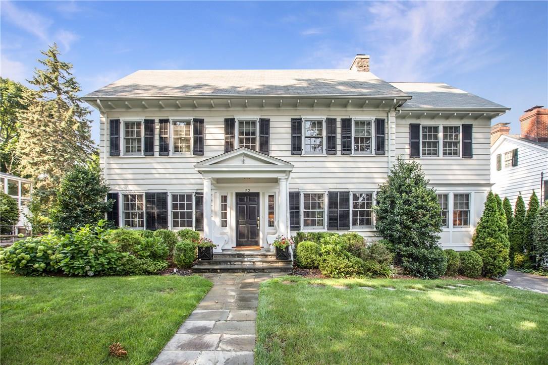52 Central Avenue Rye, NY 10580 - Photo 1 of 1 a front view of a house with a yard