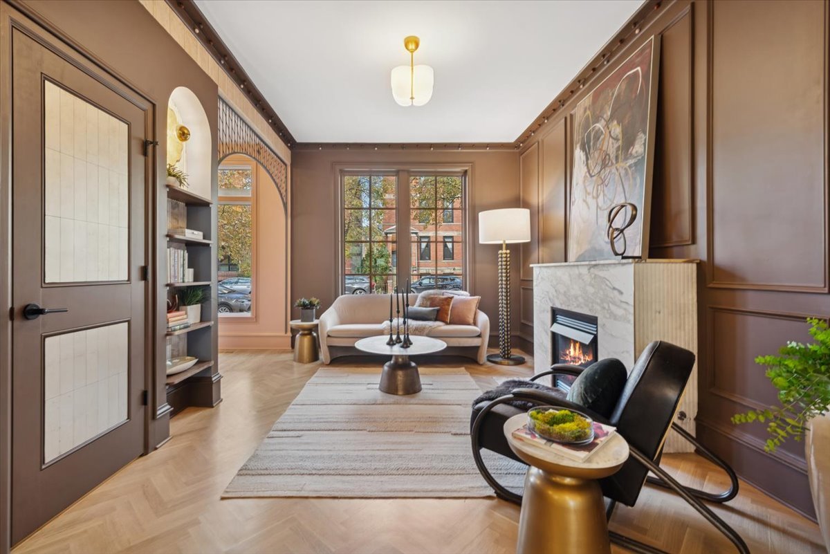 2337 West Belden Avenue Chicago, IL 60647 - Photo 22 of 53 a living room with furniture and a fireplace