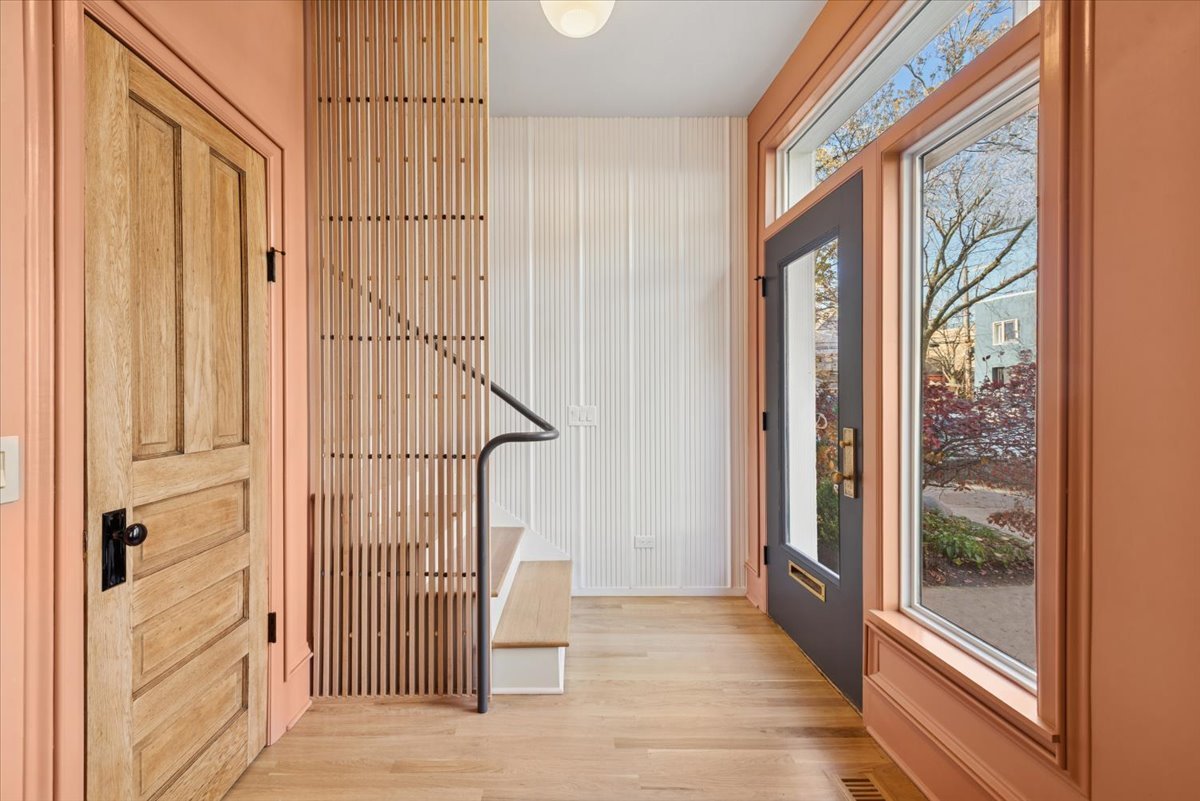 2337 West Belden Avenue Chicago, IL 60647 - Photo 27 of 53 a view of entryway with wooden floor and windows