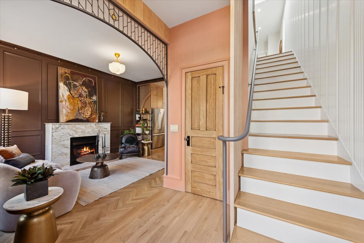 2337 West Belden Avenue Chicago, IL 60647 - Photo 28 of 53 a living room with furniture and a fireplace