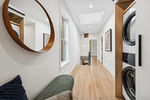 a bathroom with a sink toilet vanity and bathtub
