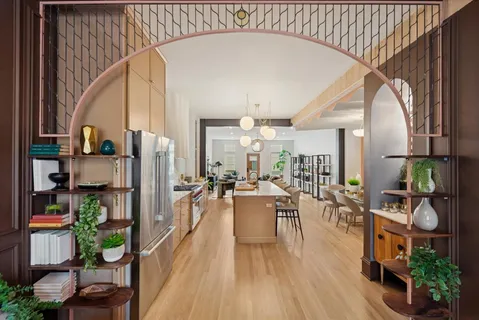 a view of a kitchen and dining room