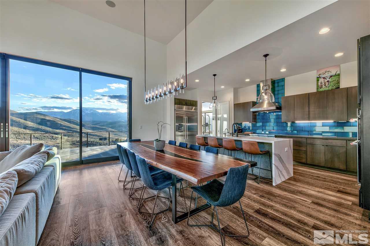 1430 Willomonte Road Reno, NV 89521 - Photo 4 of 40 a kitchen with a table chairs stove and kitchen view
