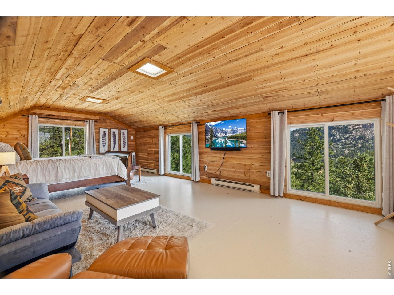 128 Elk Road Lyons, CO 80540 - Photo 41 of 50 Lots of windows to feel like you are in the trees