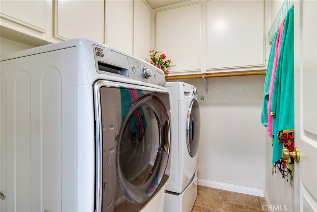 20885 Bakal Drive Riverside, CA 92508 - Photo 17 of 47 a utility room with dryer and washer