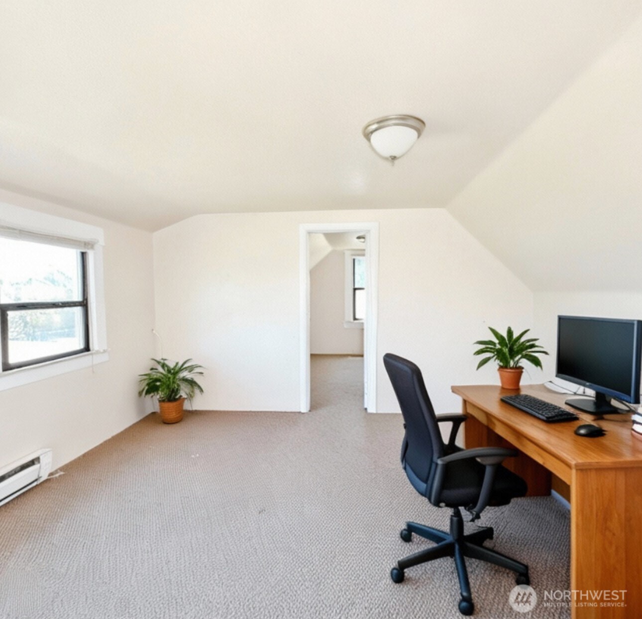 1202 West Perry Street Aberdeen, WA 98520 - Photo 20 of 35 a view of a workspace with furniture and a window
