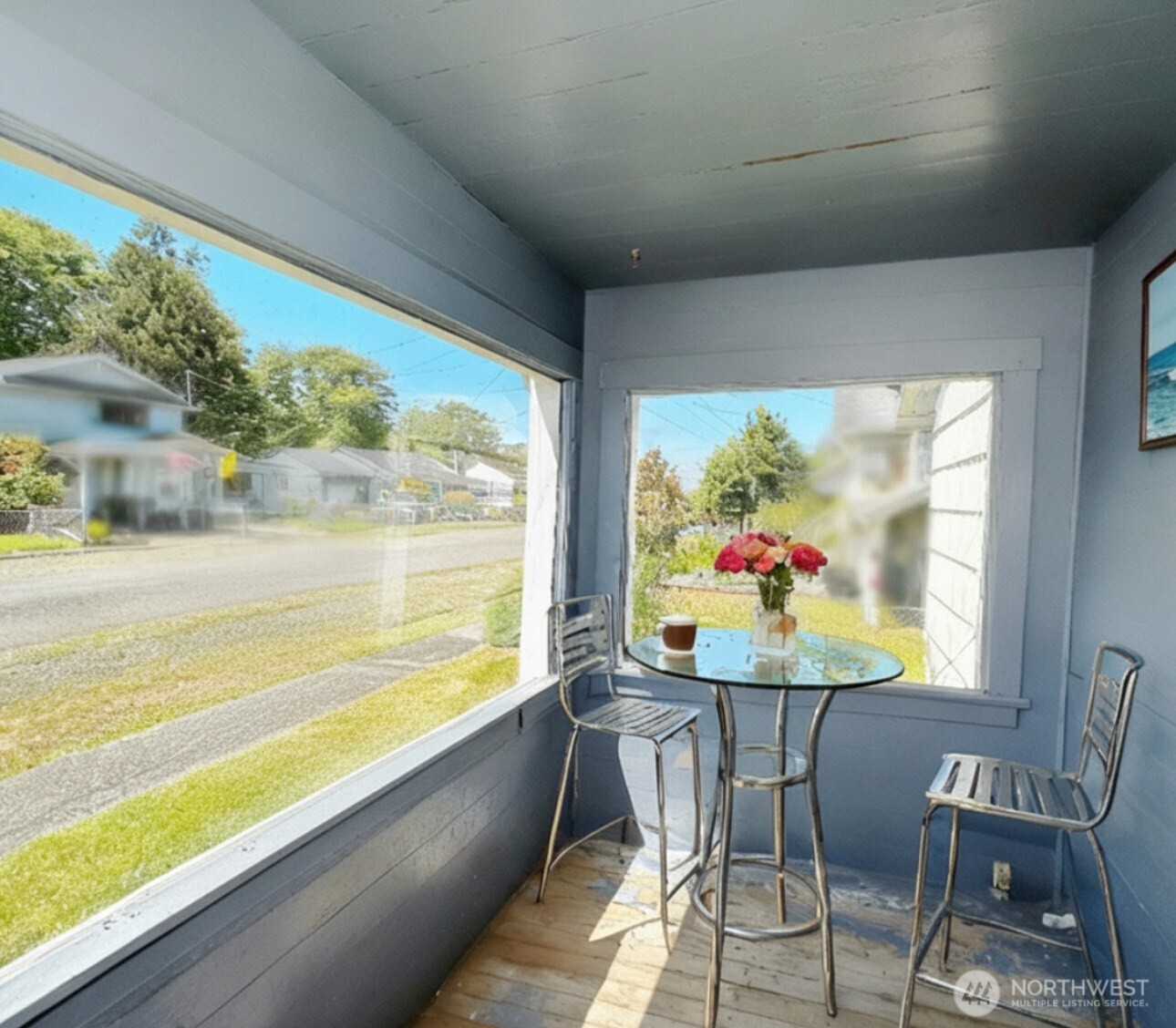 1202 West Perry Street Aberdeen, WA 98520 - Photo 5 of 35 a room with dining table and a large window