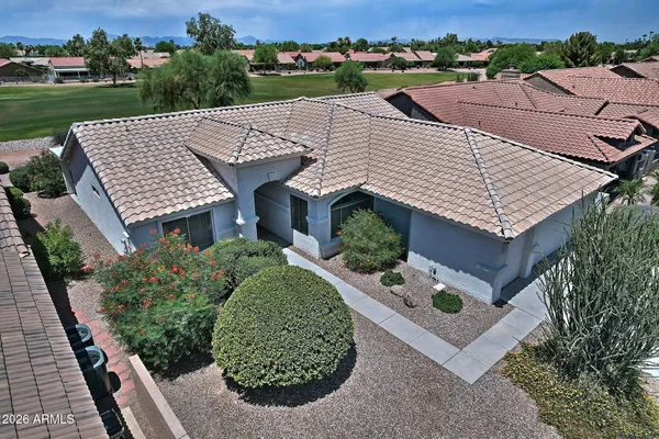 an aerial view of a house with a garden
