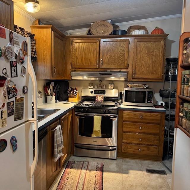 910 Robin Drive Apollo, PA 15613 - Photo 14 of 22 a kitchen with stainless steel appliances granite countertop a stove and a sink