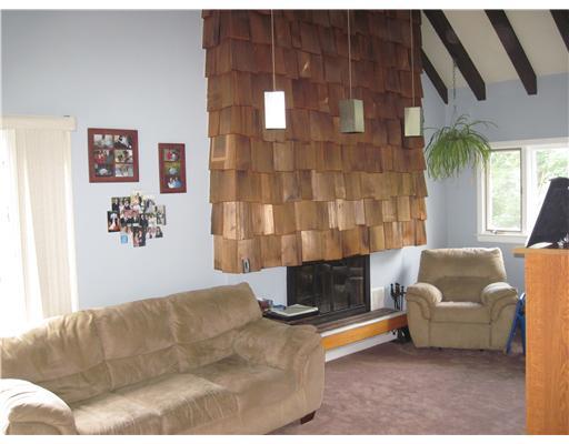 113 Waycross Road Greensburg, PA 15601 - Photo 3 of 12 Family Room. Family room offers a vaulted and beamed ceiling, wood burning firplace, and panaoamic views.