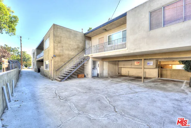 a view of an house with entryway and a building