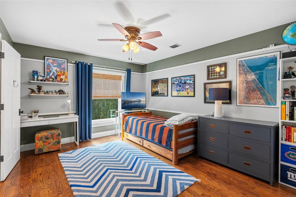 2501 Winter Park Road Winter Park, FL 32789 - Photo 48 of 63 a bedroom with a bed and wooden floor