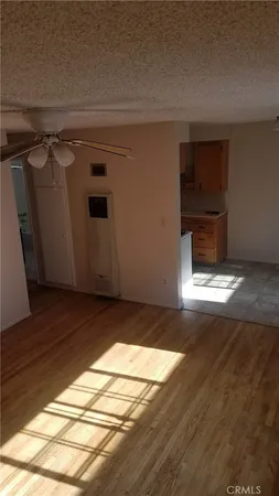 a kitchen with sink a stove and cabinets