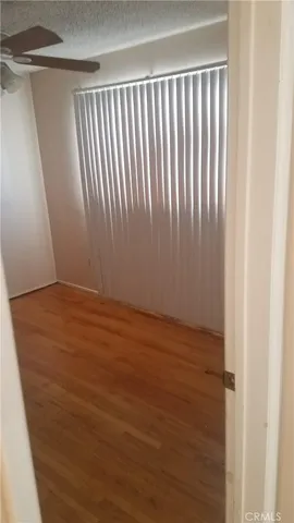 a bathroom with a sink vanity and mirror