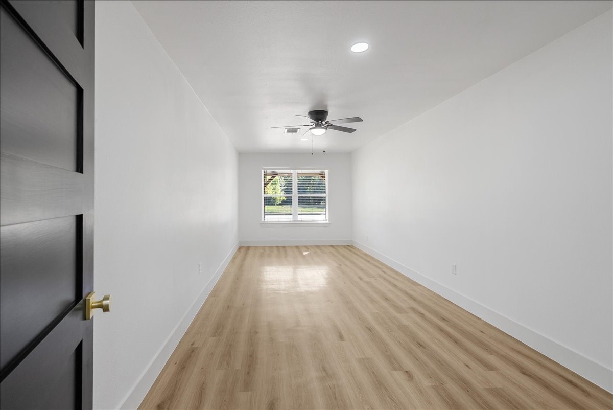 5219 Cosby Street Houston, TX 77021 - Photo 38 of 50 Recessed lighting mimics the afternoon sun, ensuring this voluminous space feels bright and welcoming at any hour.