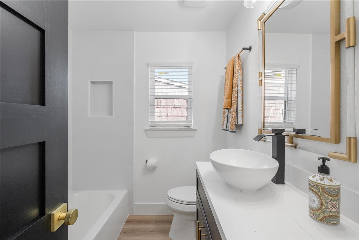 5219 Cosby Street Houston, TX 77021 - Photo 44 of 50 This second full bath features a pristine shower-tub combination and the same high-end finishes found throughout the home.