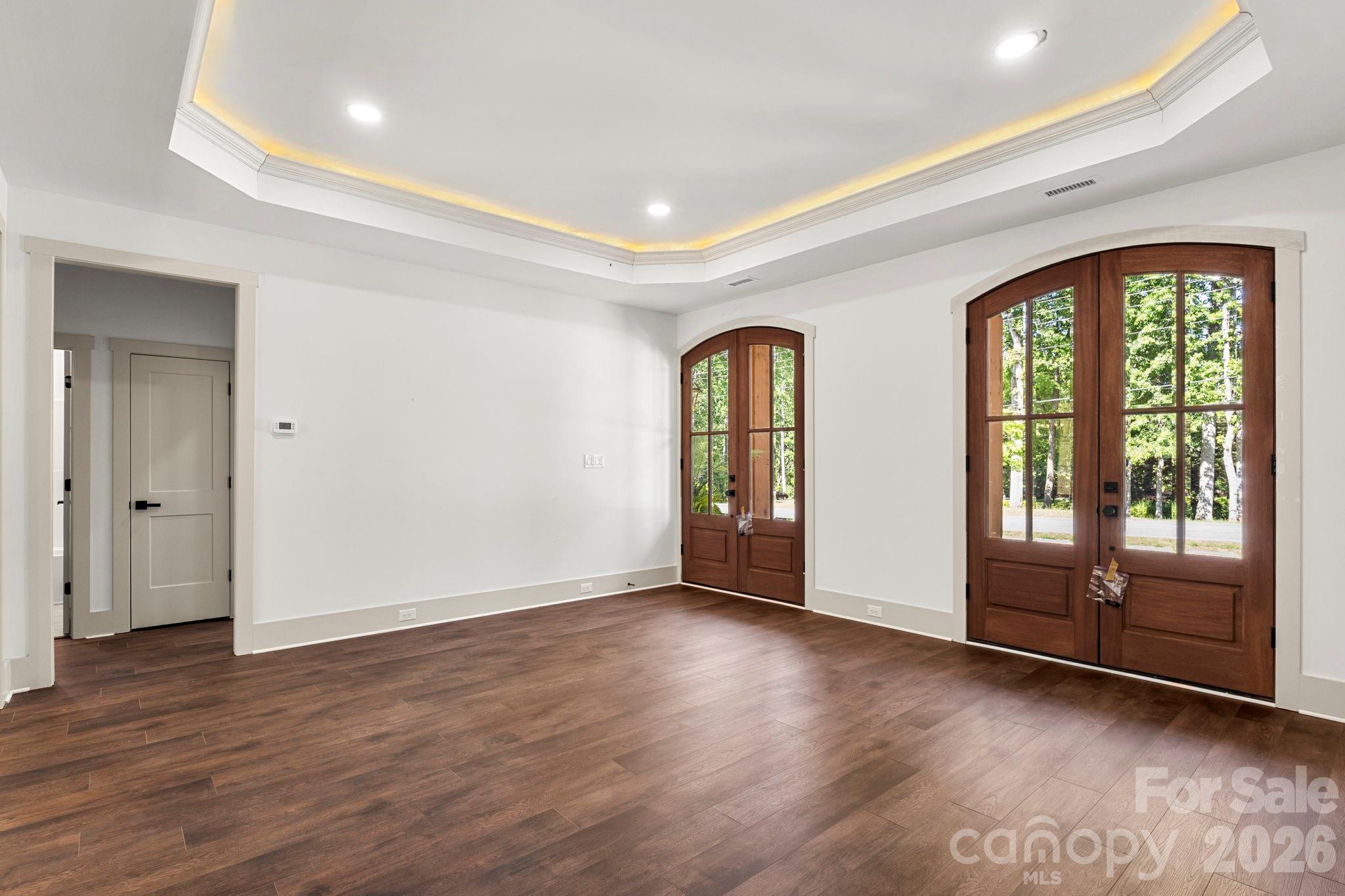 1167 Tirzah Road Rock Hill, SC 29732 - Photo 5 of 25 a view of an empty room with glass door and a window