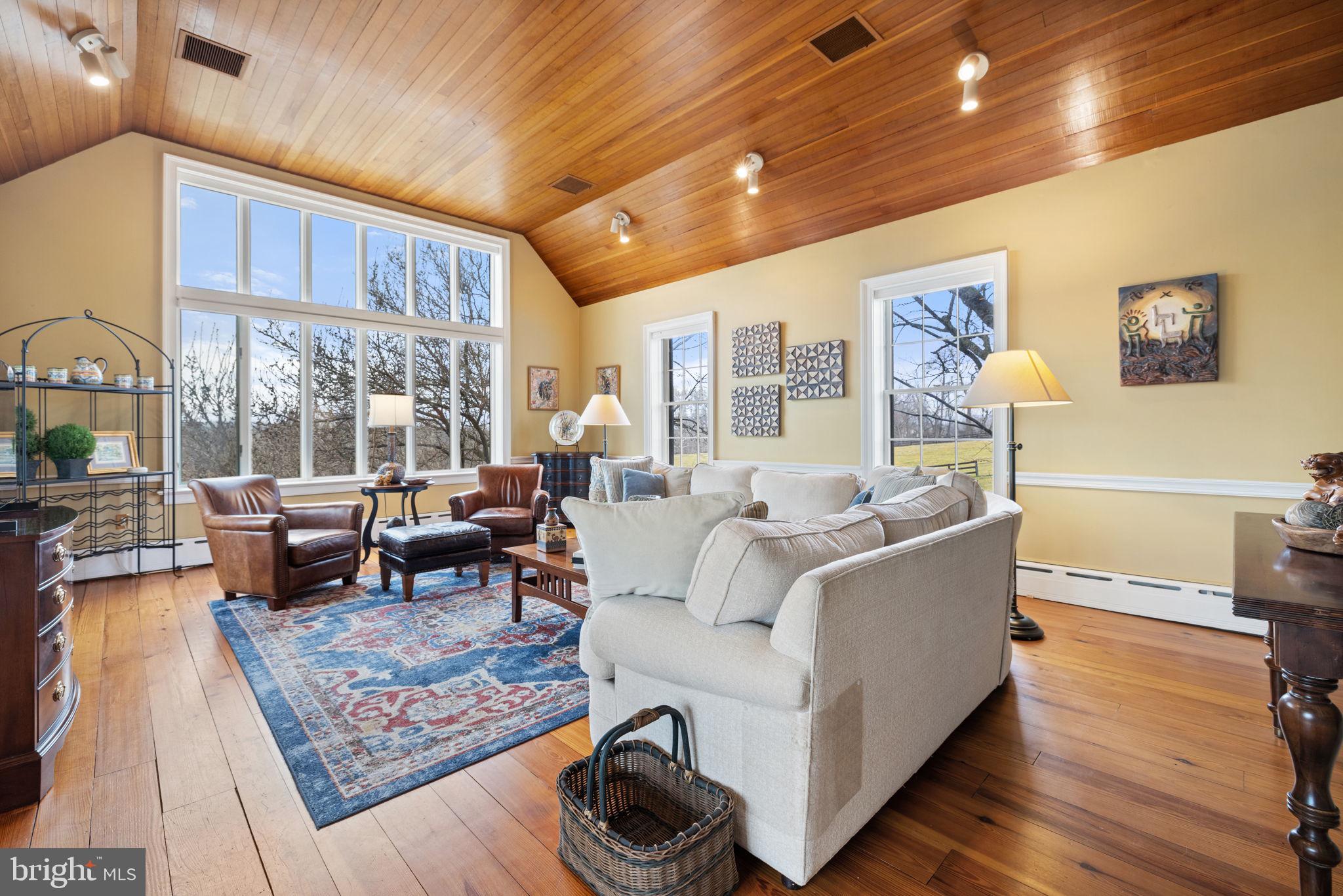 20385 Beaverdam Bridge Road Purcellville, VA 20132 - Photo 42 of 150 Grand Sitting Room with Sunset and Meadow Views.