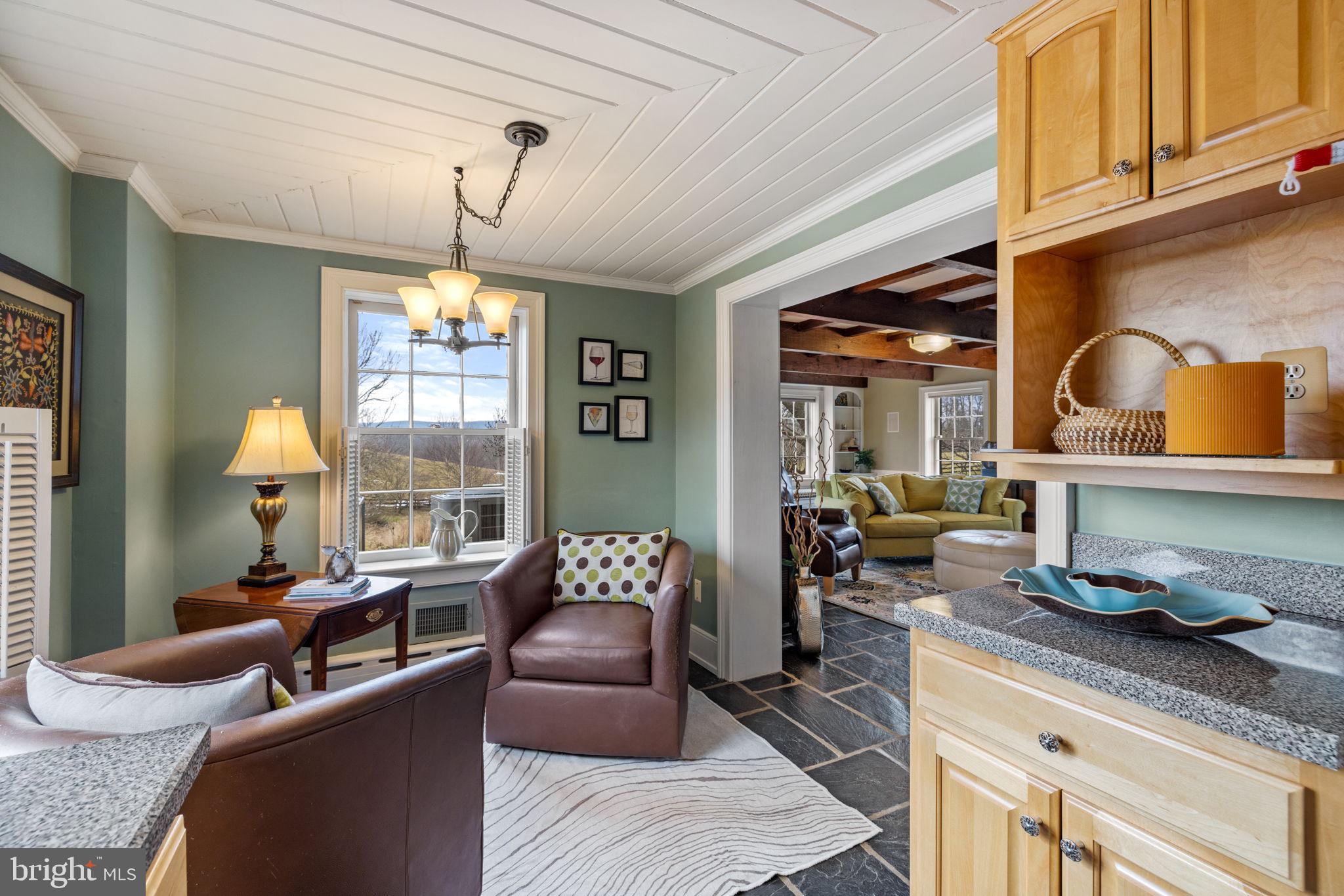20385 Beaverdam Bridge Road Purcellville, VA 20132 - Photo 82 of 150 View from LL Kitchen into Entertainment room.