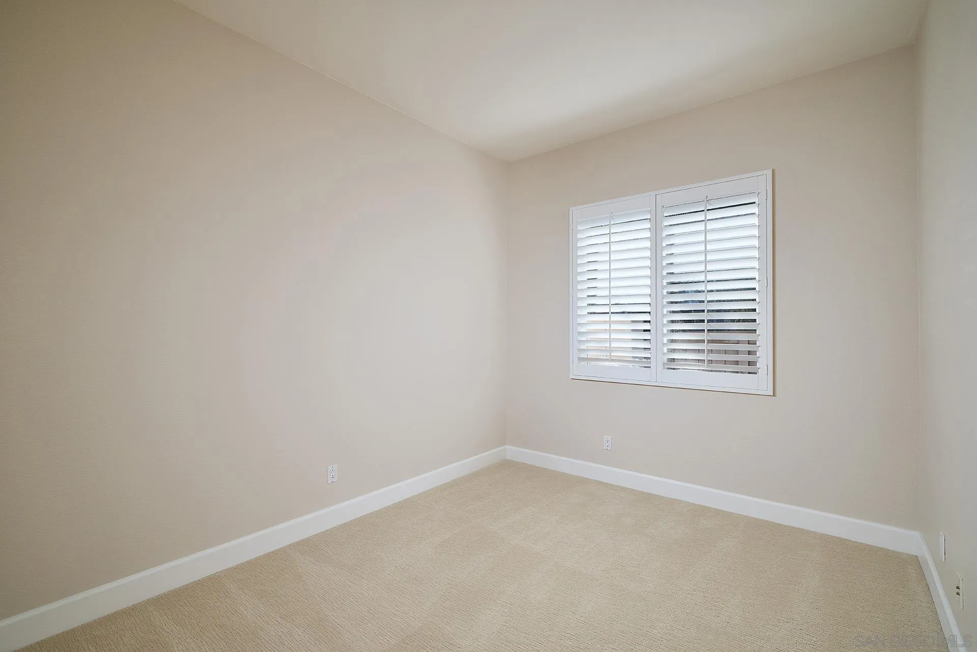 6109 Paseo Tesoro Carlsbad, CA 92009 - Photo 17 of 34 an empty room with a window