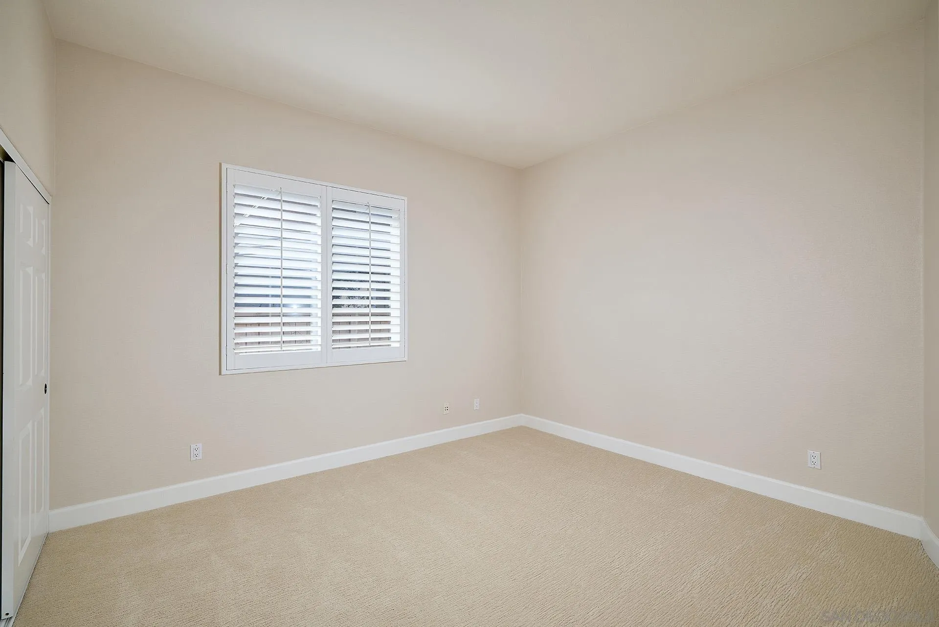 6109 Paseo Tesoro Carlsbad, CA 92009 - Photo 18 of 34 an empty room with a window