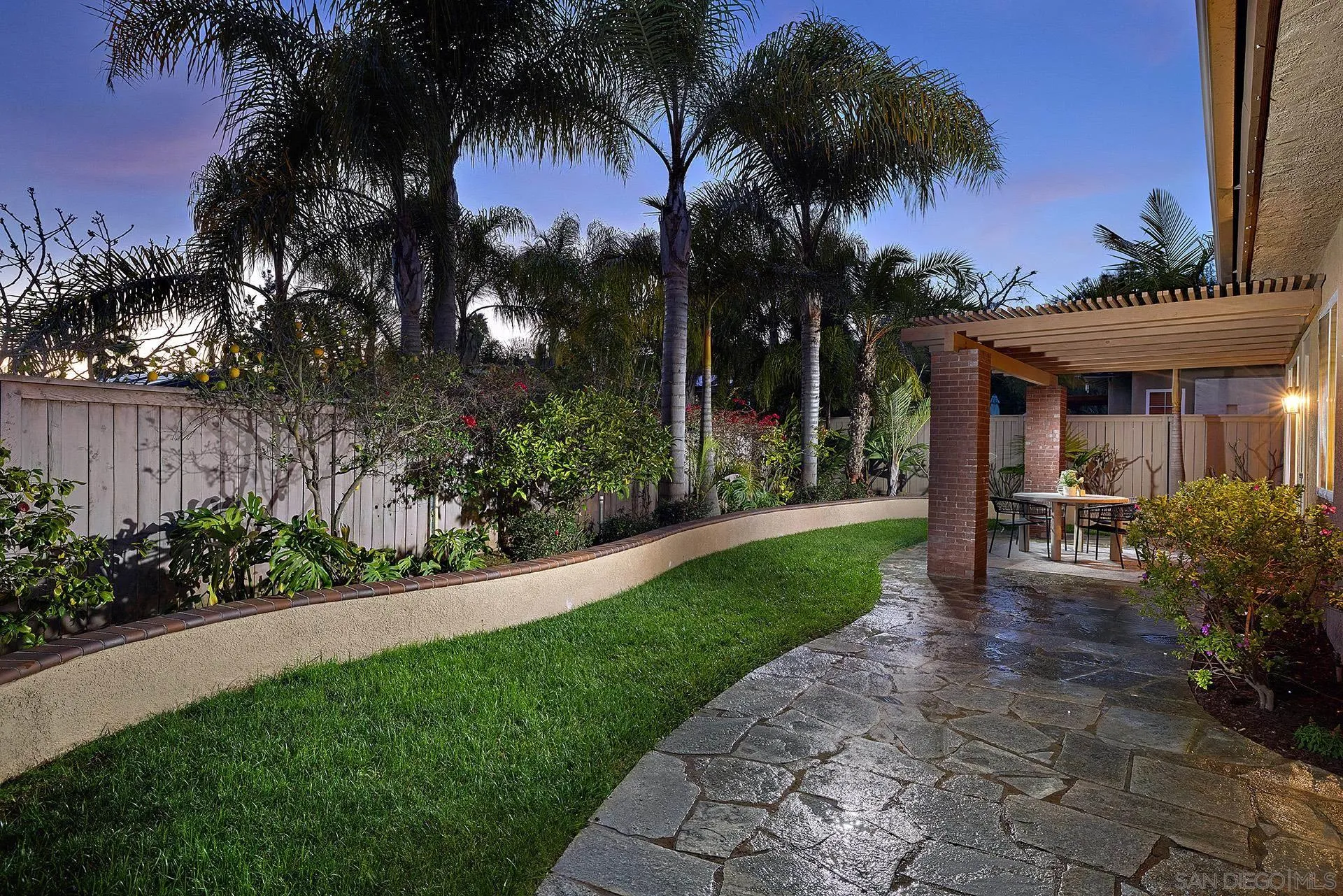 6109 Paseo Tesoro Carlsbad, CA 92009 - Photo 21 of 34 a view of a house with a yard and tree s