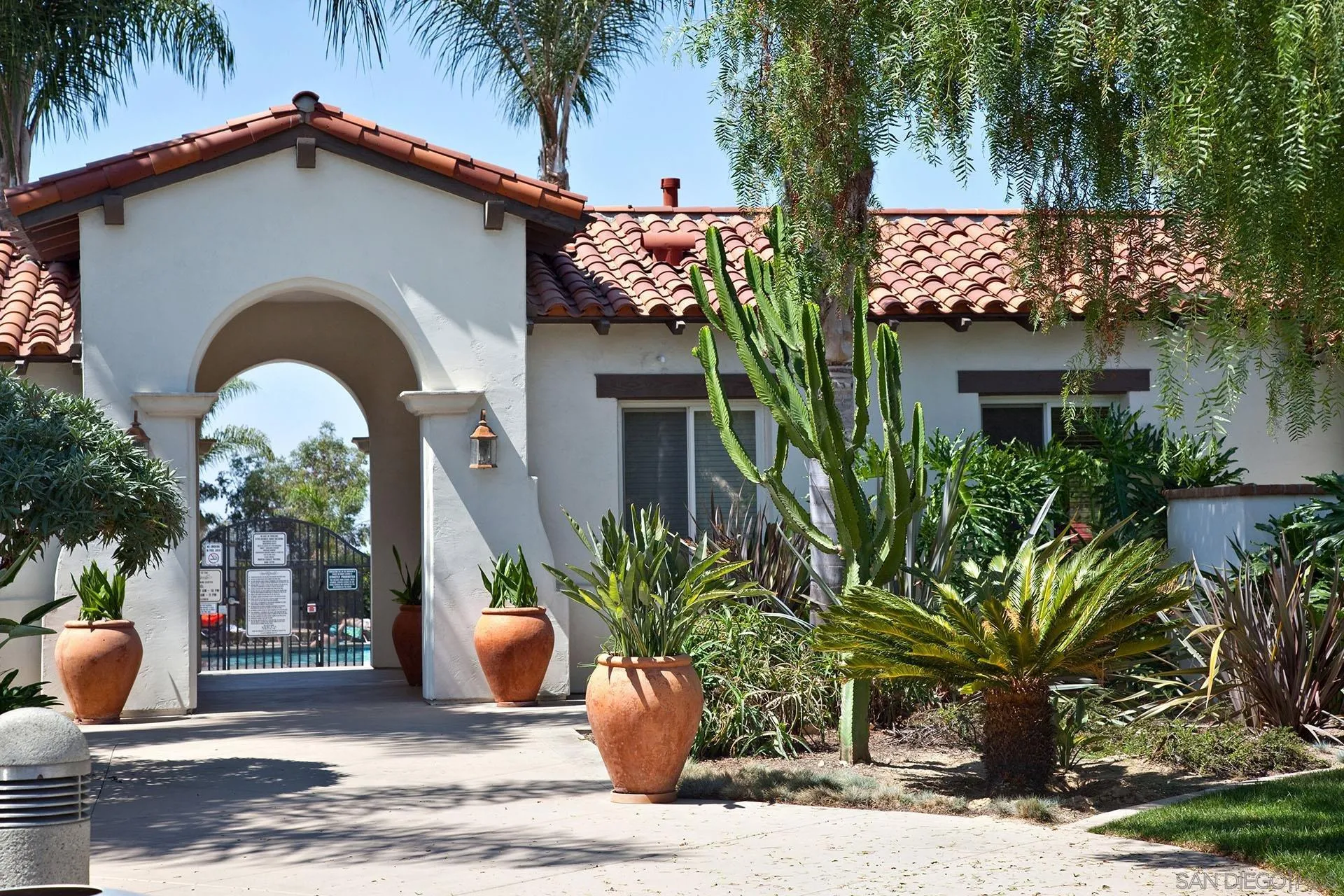 6109 Paseo Tesoro Carlsbad, CA 92009 - Photo 30 of 34 a front view of a house with a yard