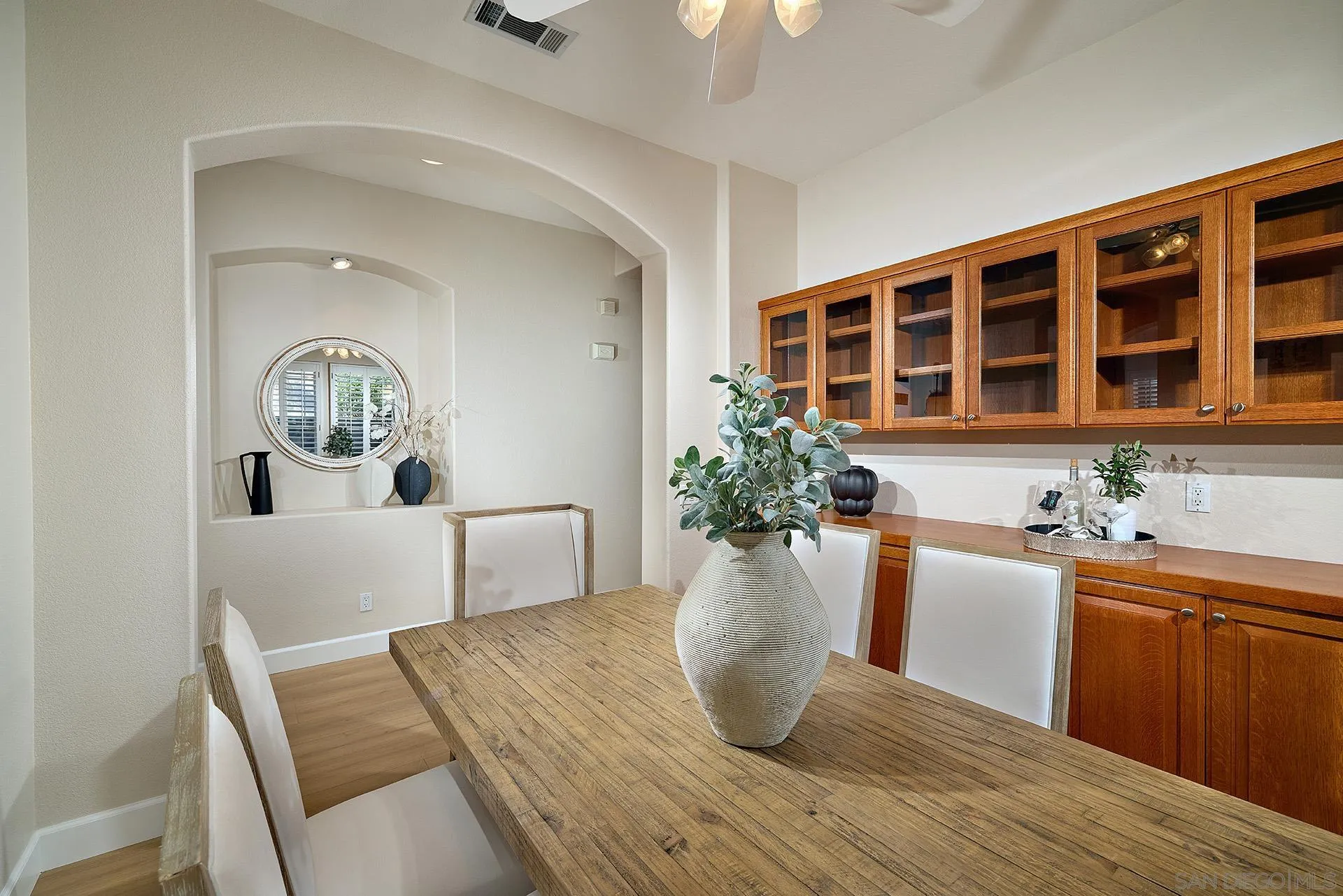 6109 Paseo Tesoro Carlsbad, CA 92009 - Photo 8 of 34 a view of a dining room with furniture and window