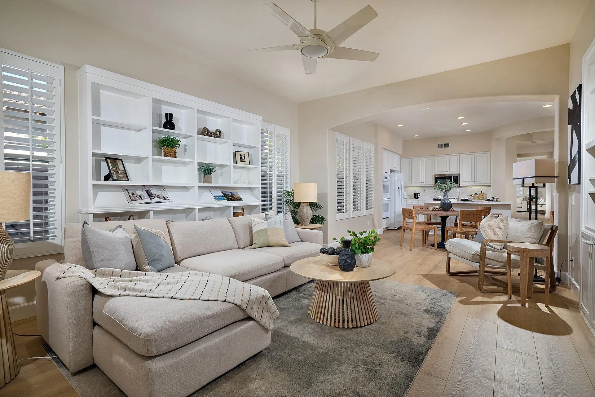 6109 Paseo Tesoro Carlsbad, CA 92009 - Photo 10 of 34 a living room with furniture kitchen view and a large window