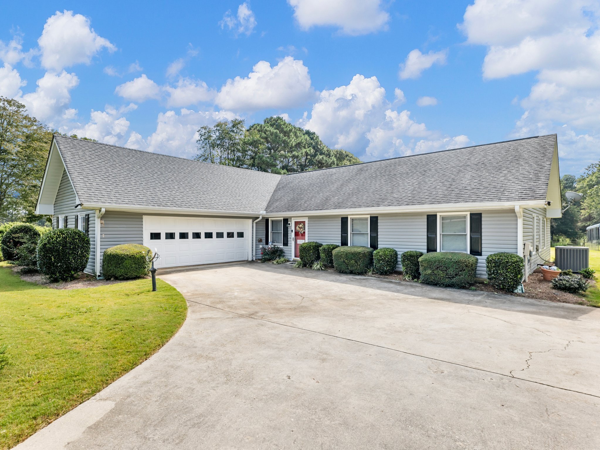 1717 Ike Stone Road Monroe, GA 30656 - Photo 1 of 1 a view of a house with backyard and garden